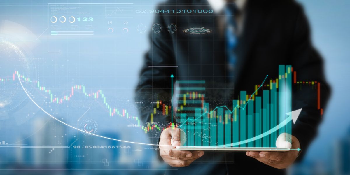 man holding virtual graph showing business growth chart