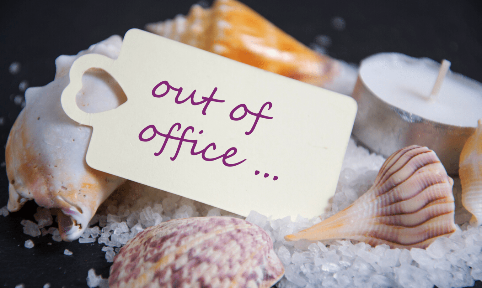 out of office tag resting on seashells | long service leave qld | MGI South Qld