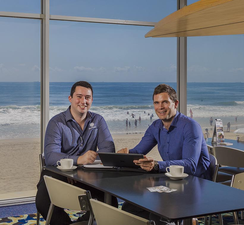 MGI Sunshine Coast accountant Steve Greene working with a client at Maroochydore Surf Club