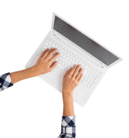 hands of tax advisor working on tax compliance on a laptop