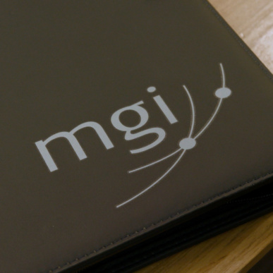 MGI logo on a folio | not for profit specialists