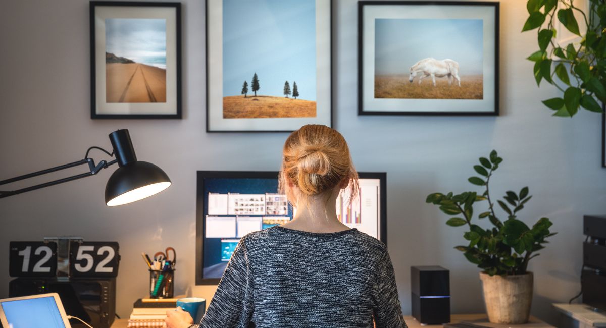 woman with back to camera working from home