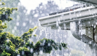 rain pouring off a roof during recent storms