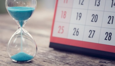 hourglass and calendar highlighting important tax deadlines approching