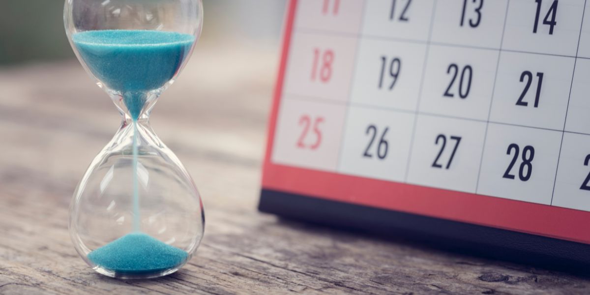 hourglass and calendar highlighting important tax deadlines approching