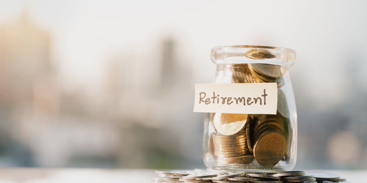 jar of coins with a label saying 'retirement' used on a blog about the increase in the superannuation transfer balance cap
