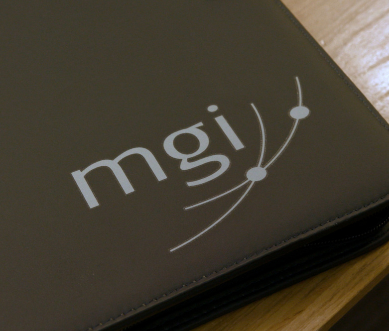 MGI logo on a folio | not for profit specialists