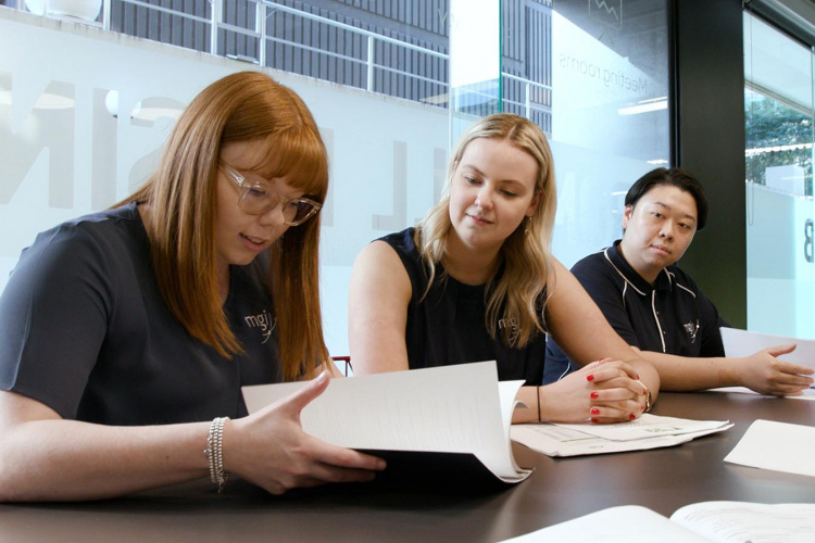 MGI's specialist accountants for doctors, dentists and medical professionals working with a client | MGI
